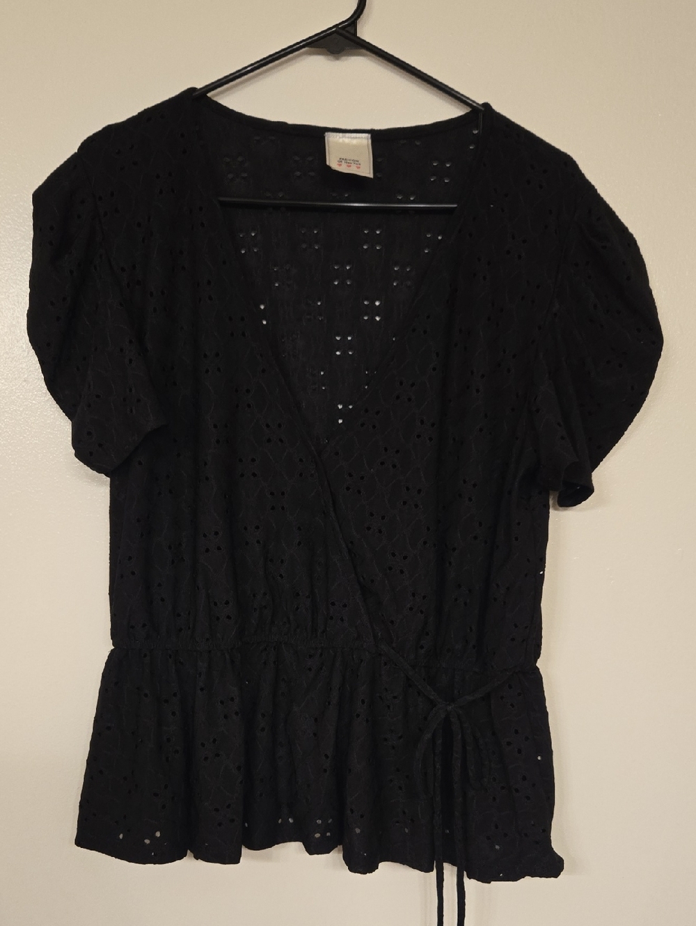 Black Eyelet Wrap Peplum Top